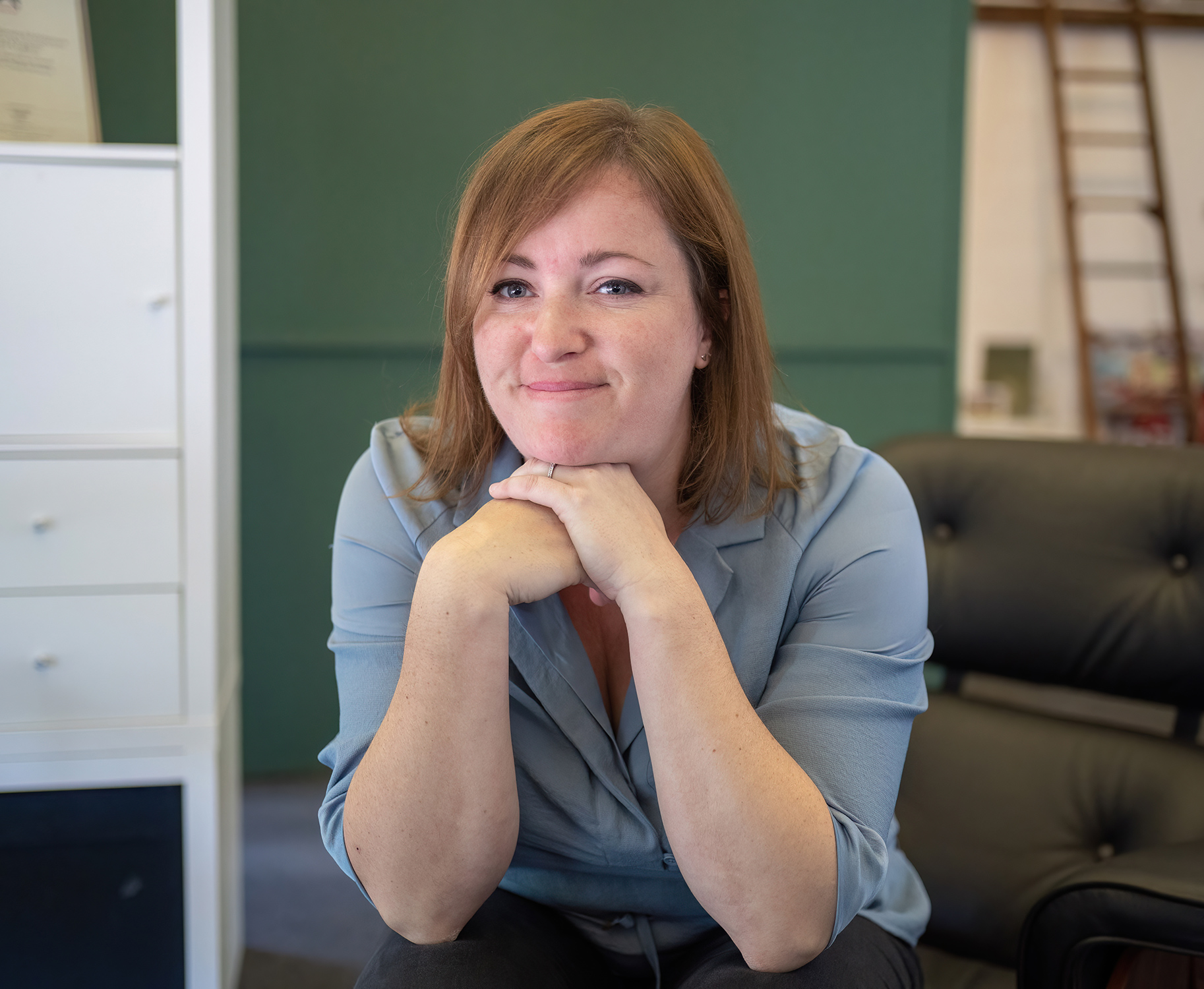 Rebecca Smith sitting on chair